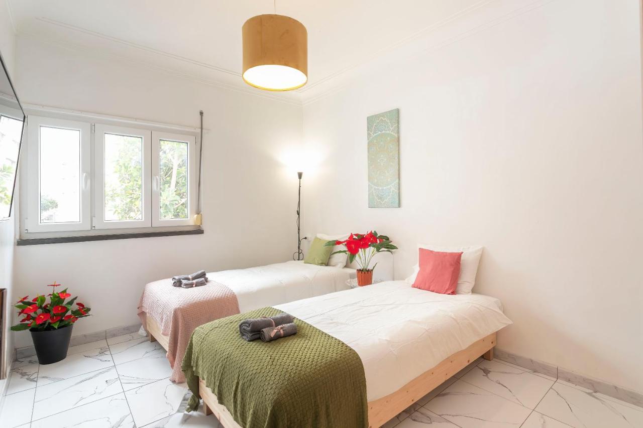 Quarto Twin com Casa de Banho Partilhada