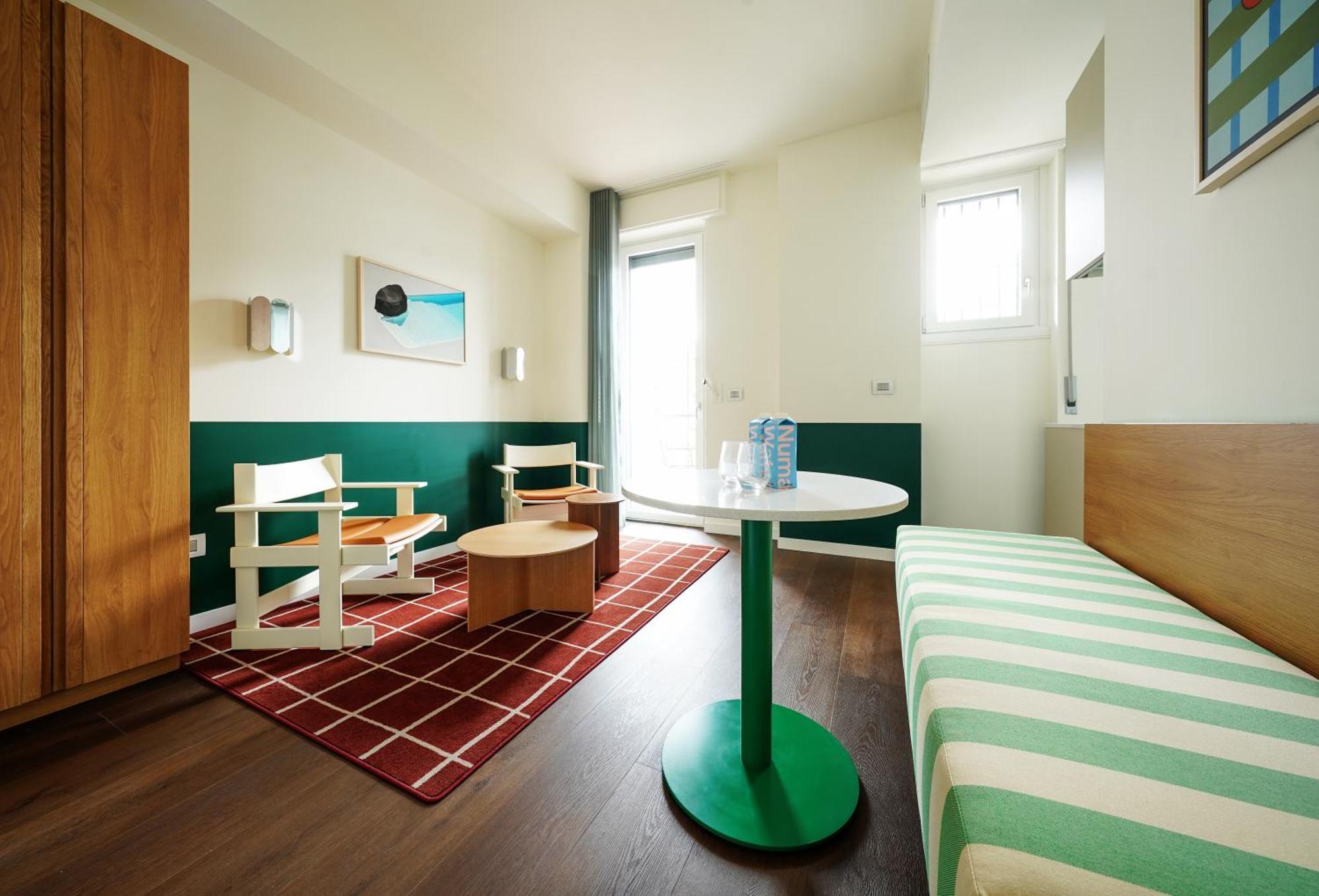 Medium Studio with Kitchenette, Balcony and Separate Living Area