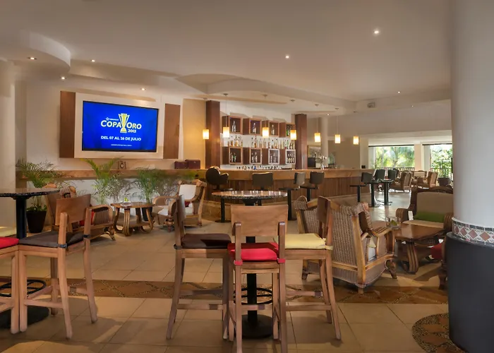 Hotel con tenis: The Reef Coco Beach Resort & Spa