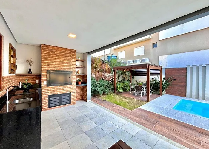  192 - Casa luxo com 5 suítes e piscina aquecida